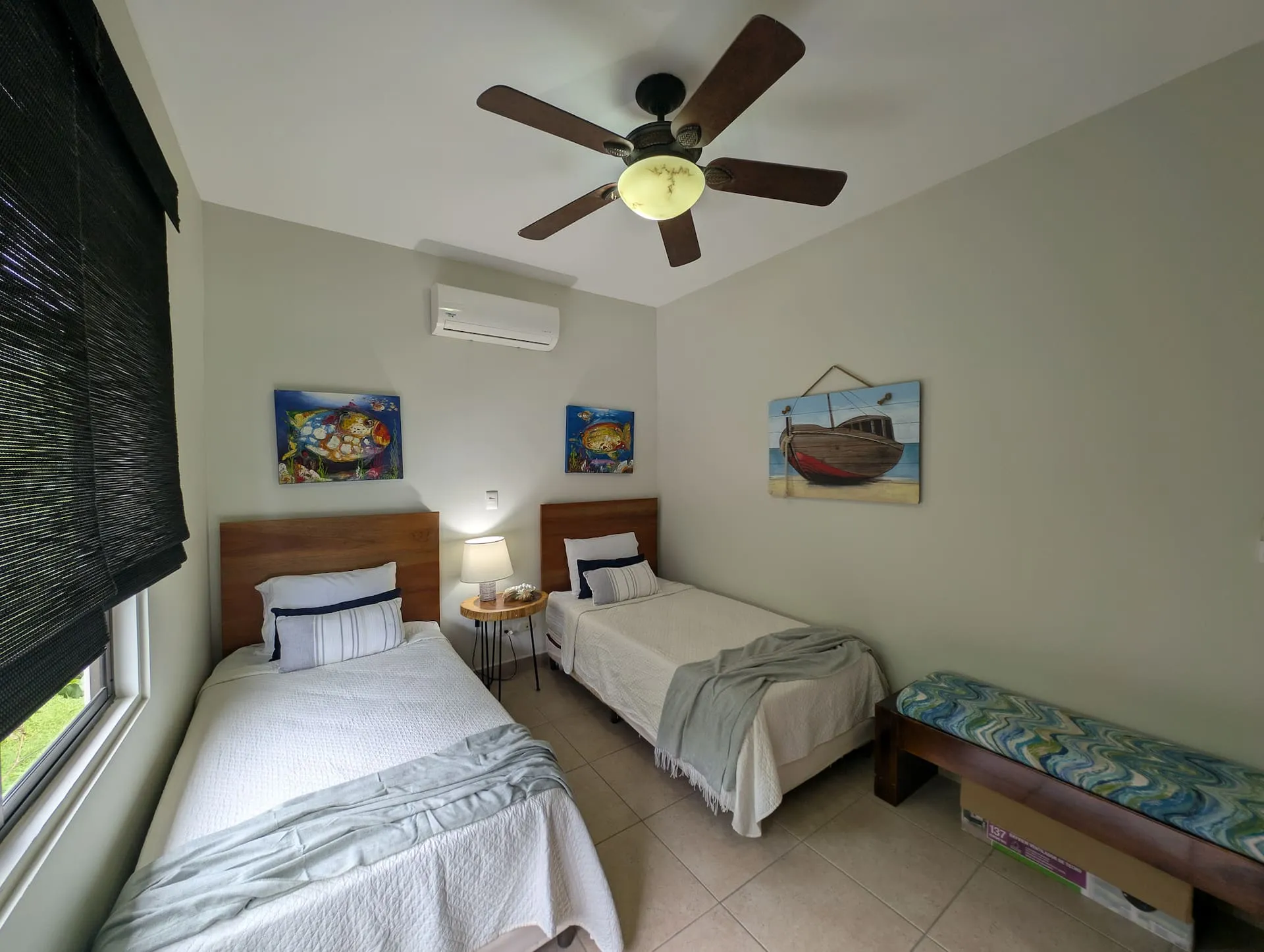 Second bedroom with two twin beds, suited to families.